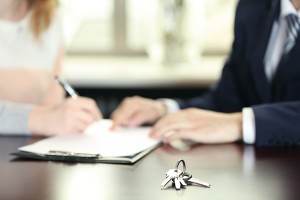 Signing of contract and keys in office