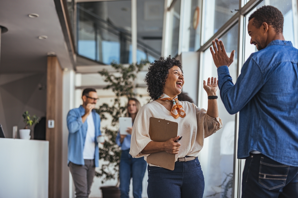 HR professional interviewing a candidate as part of an Attracting Top Talent recruitment and employer branding strategy.