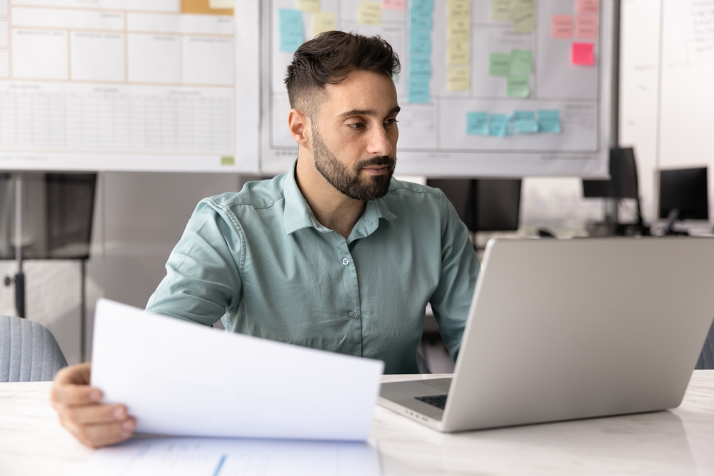 HR professional interviewing a candidate while implementing strategies for how to attract millennial talent.