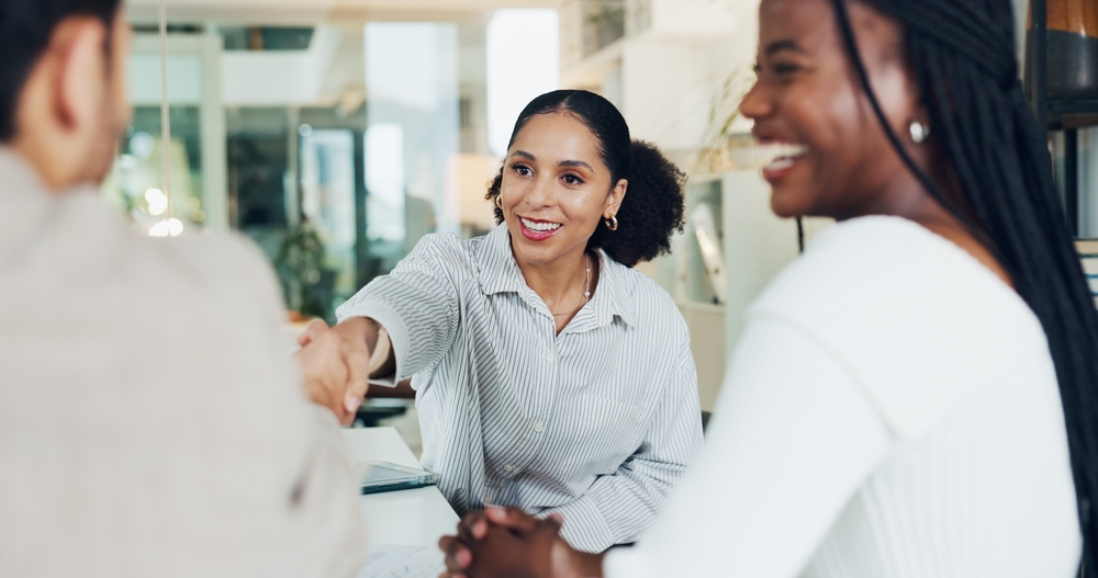 Hiring manager speaking with a candidate during an interview supported by digital marketing for recruitment efforts.
