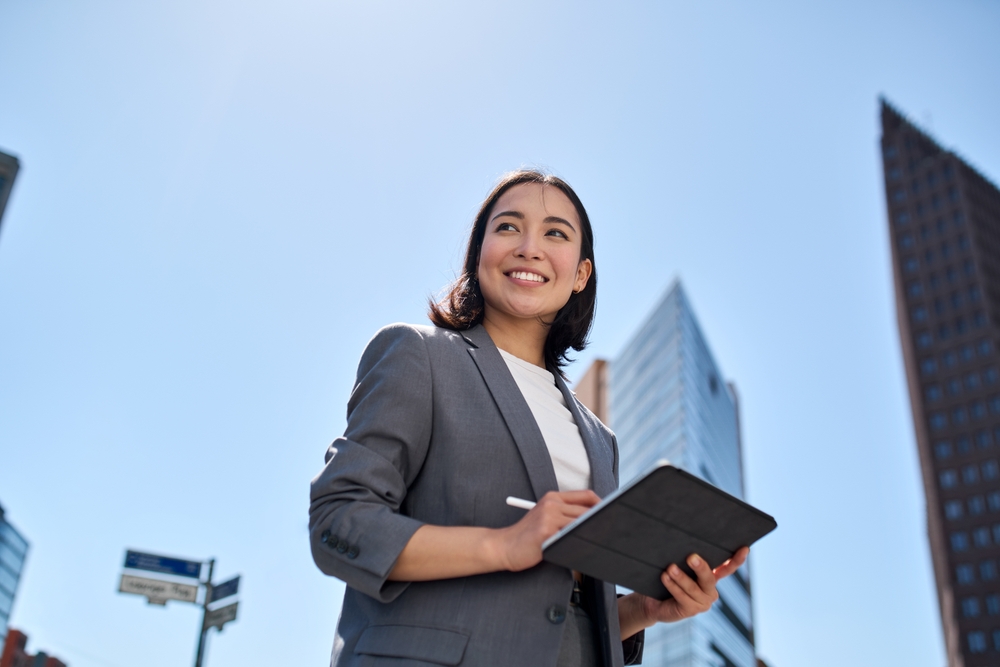 Employer branding agency consultant standing outside an office block